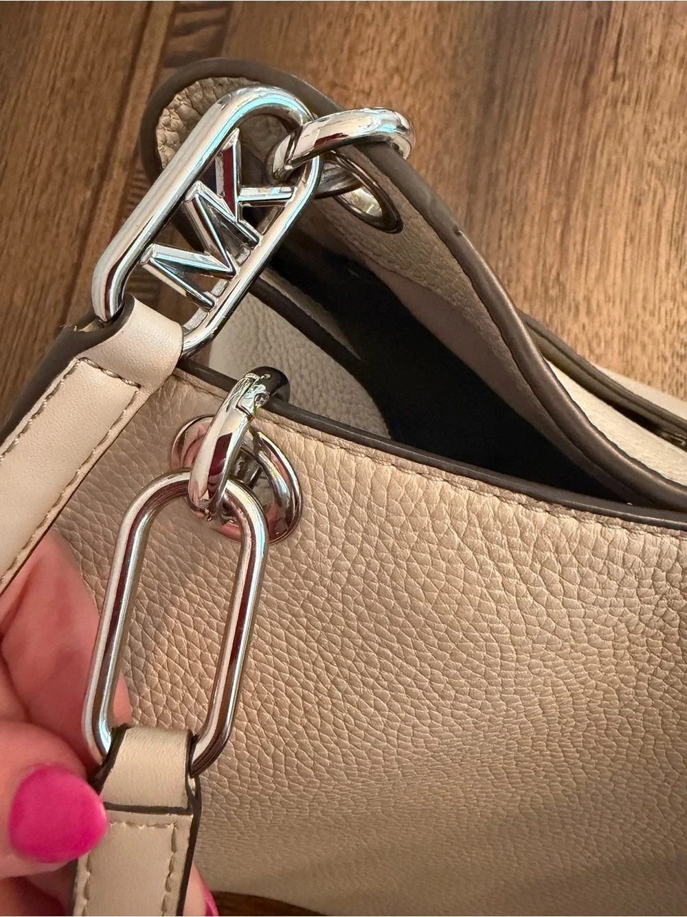 Michael Kors Raven pebbled leather shoulder bag featuring silver-tone hardware
